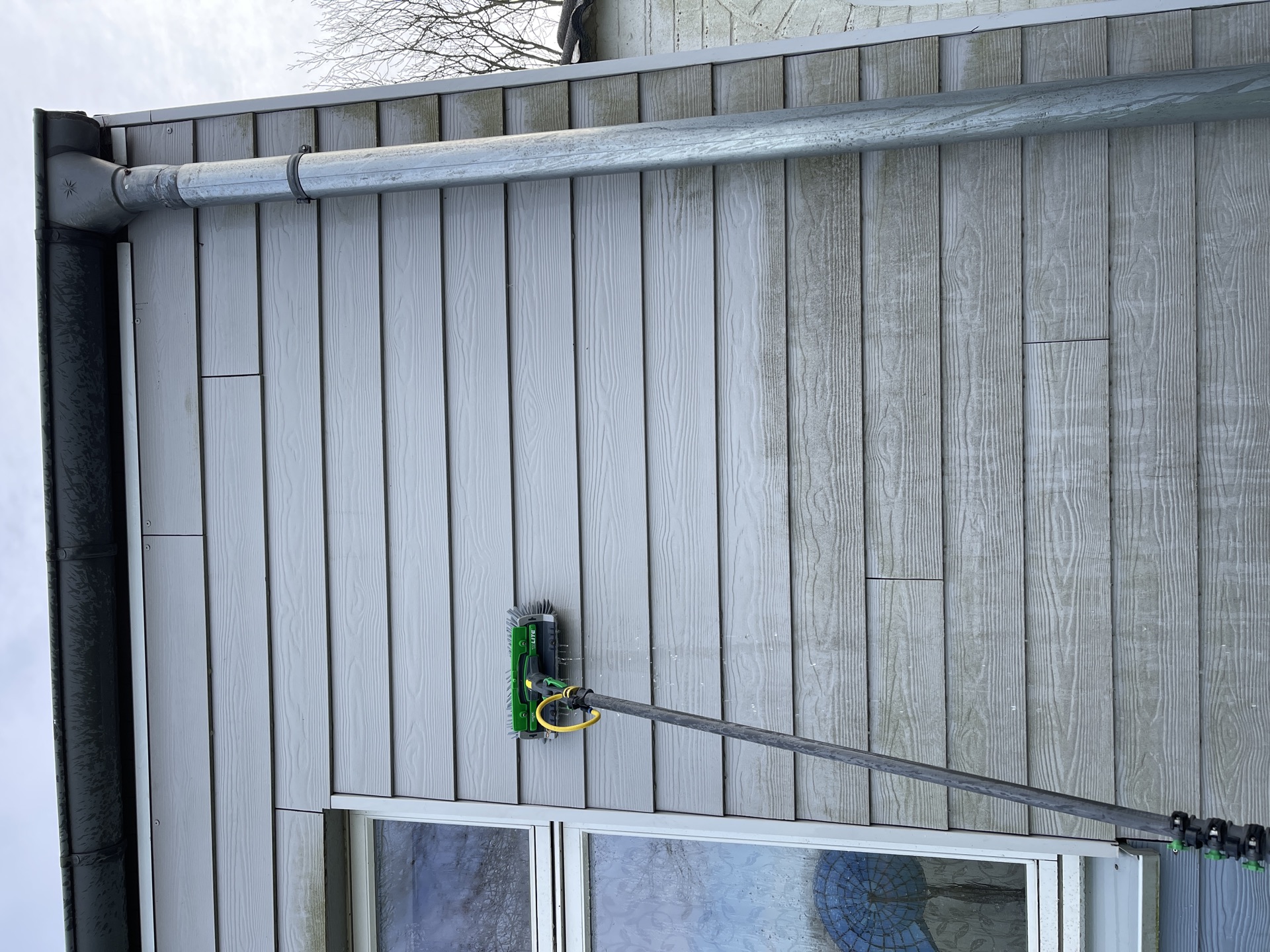 NordFlut WFP-Reinigung Holzoptik-Fassade – Algenentfernung Nordseeküste